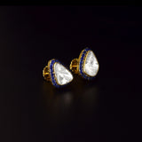Diamond Polki & Blue Sapphire Tops Elegant Diamond Polki tops surrounded by vibrant blue sapphires, blending timeless heritage, refined craftsmanship, and effortless sophistication for every occasion.(KME2534)