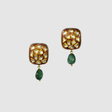 Timeless diamond polki tops adorned with rich red meenakari and elegant emerald maniya drops, celebrating heritage craftsmanship with refined sophistication.(KME2548)
