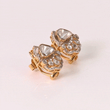 A graceful fusion of Polki and brilliant diamonds, these statement earrings celebrate timeless elegance with a contemporary silhouette.(KME2557)