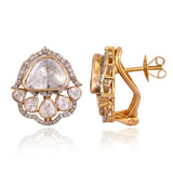 A graceful fusion of Polki and brilliant diamonds, these statement earrings celebrate timeless elegance with a contemporary silhouette.(KME2557)