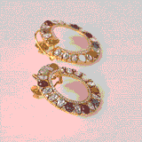 Inspired by tradition, these Navratan and Polki diamond earrings bring vibrant colour, elegance, and timeless charm to every look.(KME2559)