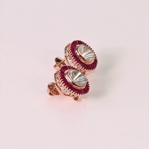Timeless Polki artistry shines through a radiant ruby halo, making these elegant tops a true statement of refined luxury.(KME2561)