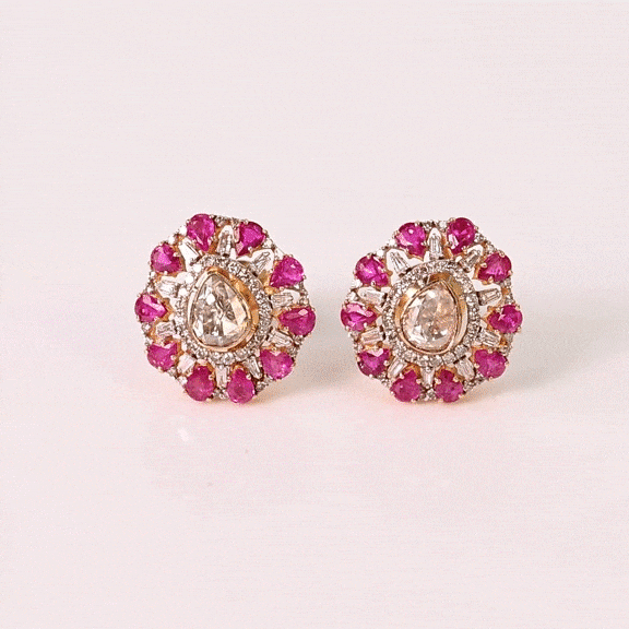 Inspired by floral beauty, these ruby and diamond earrings radiate brilliance, grace, and timeless charm.(KME2563)