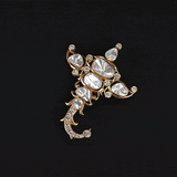 Crown your special day with the brilliance of natural Polki diamonds and sparkling round diamonds in this exquisitely crafted Kalangi.(KMKL0039)