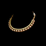 Radiate regal charm with this stunning red enameled necklace and earring set, intricately crafted with uncut diamonds. A perfect blend of heritage and glamour for festive occasions and bridal elegance. (KMNE3553)