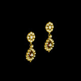 Radiate regal charm with this stunning red enameled necklace and earring set, intricately crafted with uncut diamonds. A perfect blend of heritage and glamour for festive occasions and bridal elegance. (KMNE3553)