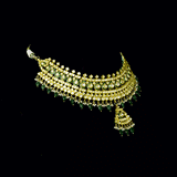 Royal Green Meenakari Polki Set A majestic green meenakari necklace with diamond polki, emerald bead and pearl hangings, paired with elegant earrings for timeless bridal grandeur and royal sophistication.(KMNE3568)