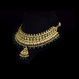 Royal Green Meenakari Polki Set A majestic green meenakari necklace with diamond polki, emerald bead and pearl hangings, paired with elegant earrings for timeless bridal grandeur and royal sophistication.(KMNE3568)