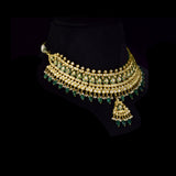 Royal Green Meenakari Polki Set A majestic green meenakari necklace with diamond polki, emerald bead and pearl hangings, paired with elegant earrings for timeless bridal grandeur and royal sophistication.(KMNE3568)