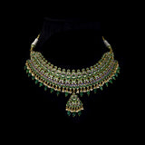 Royal Green Meenakari Polki Set A majestic green meenakari necklace with diamond polki, emerald bead and pearl hangings, paired with elegant earrings for timeless bridal grandeur and royal sophistication.(KMNE3568)