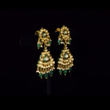 Royal Green Meenakari Polki Set A majestic green meenakari necklace with diamond polki, emerald bead and pearl hangings, paired with elegant earrings for timeless bridal grandeur and royal sophistication.(KMNE3568)