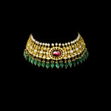 Grace your neckline with this elegant white choker necklace and tops set, featuring uncut diamonds and a striking center pink stone. A refined choice for contemporary brides and festive wear.(KMNE3576)