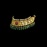 Grace your neckline with this elegant white choker necklace and tops set, featuring uncut diamonds and a striking center pink stone. A refined choice for contemporary brides and festive wear.(KMNE3576)