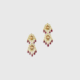 Beautiful red enameled flower design necklace and earrings set with sparkling uncut diamond polki, strung with ruby maniya and pearls. Perfect to add a touch of tradition and elegance to any special occasion.(KMNE3608)
