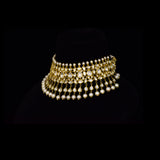 Elevate your style with this stunning semi-choker necklace and earring pair, featuring dazzling uncut diamond polki and a striking larger center stone, beautifully strung with pearls. Perfect for adding royal charm to any special occasion.(KMNE3611)