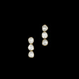 Understated elegance shines through this single-line necklace and earring pair, featuring uncut diamond Polki. A graceful blend of tradition and simplicity—perfect for intimate celebrations and timeless everyday sophistication.(KMNE3620)