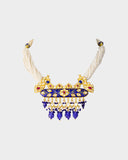 A traditional necklace crafted with diamond polki, highlighted by rich blue meena work and finished with elegant pearl stringing. Reflecting classic Indian artistry, this timeless design is perfect for weddings and festive occasions. (KMNE3639)
