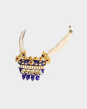 A traditional necklace crafted with diamond polki, highlighted by rich blue meena work and finished with elegant pearl stringing. Reflecting classic Indian artistry, this timeless design is perfect for weddings and festive occasions. (KMNE3639)
