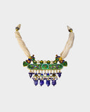 A traditional necklace crafted with diamond polki, highlighted by rich blue meena work and finished with elegant pearl stringing. Reflecting classic Indian artistry, this timeless design is perfect for weddings and festive occasions. (KMNE3639)