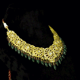 Royal Polki Bridal Necklace Set A magnificent diamond polki necklace featuring ruby detailing, emerald bead hangings, and matching statement earrings—crafted for timeless bridal elegance with regal heritage appeal.(KMNE3643)