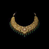 Royal Polki Bridal Necklace Set A magnificent diamond polki necklace featuring ruby detailing, emerald bead hangings, and matching statement earrings—crafted for timeless bridal elegance with regal heritage appeal.(KMNE3643)