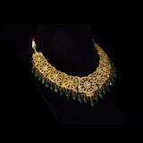 Royal Polki Bridal Necklace Set A magnificent diamond polki necklace featuring ruby detailing, emerald bead hangings, and matching statement earrings—crafted for timeless bridal elegance with regal heritage appeal.(KMNE3643)