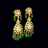 Royal Polki Bridal Necklace Set A magnificent diamond polki necklace featuring ruby detailing, emerald bead hangings, and matching statement earrings—crafted for timeless bridal elegance with regal heritage appeal.(KMNE3643)