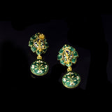 This exquisite set features luminous polki diamonds highlighted by rich green stones, embodying heritage craftsmanship and royal charm. (KMNE3675)