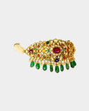 A regal Navratan stiff choker adorned with hand-set diamond polki and vibrant coloured stones, finished with emerald maniya and pearl stringing. A timeless statement of heritage craftsmanship and royal elegance. (KMNE3690)