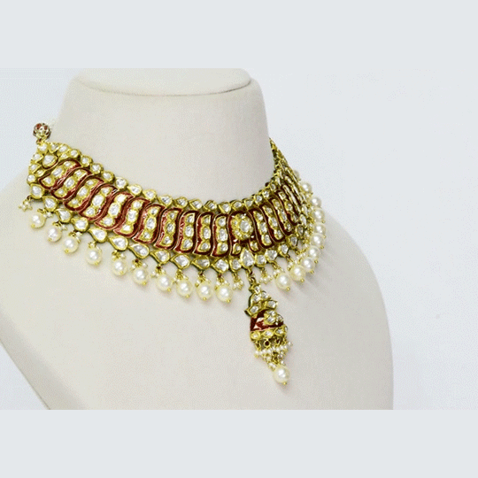 A traditional red meena cutsari necklace adorned with diamond polki and finished with pearl stringing, reflecting rich heritage and timeless elegance(KMNE3691)