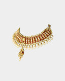 A traditional red meena cutsari necklace adorned with diamond polki and finished with pearl stringing, reflecting rich heritage and timeless elegance(KMNE3691)