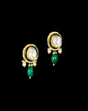 A majestic choker showcasing large polki diamonds set in striking green-enamelled gold, layered with intricate detailing, finished with cascading emerald drops and pearl fringes—opulent, bold, and exquisitely regal. (KMNE3724)