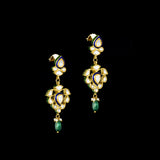 An elegant gold necklace set featuring polki diamonds with blue enamel detailing, accented by emerald maniya and delicate pearl hangings, offering a graceful blend of tradition and refined contemporary luxury. (KMNE3739)