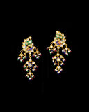 Grand statement necklace and earring pair featuring intricate peacock meenakari in vibrant hues, adorned with uncut diamond polki, highlighted by cascading multicolor beads with pearls, reflecting regal artistry and timeless bridal elegance. (KMNE3743)