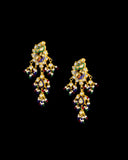 Grand statement necklace and earring pair featuring intricate peacock meenakari in vibrant hues, adorned with uncut diamond polki, highlighted by cascading multicolor beads with pearls, reflecting regal artistry and timeless bridal elegance. (KMNE3743)