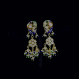 Exquisite gold necklace and earring set featuring uncut diamond polki, peacock meenakari in blue and green, and delicate pearls, blending royal heritage craftsmanship with timeless elegance for statement occasions. (KMNE3746)