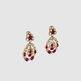Ruby & Diamond Polki Three-Line Necklace Set Grace your celebrations with this elegant three-line necklace and earrings, featuring vibrant rubies, shimmering diamond polki, and timeless craftsmanship for sophisticated traditional luxury.(KMNE3751)