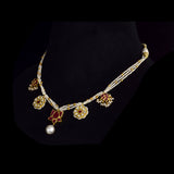 Traditional Diamond Polki & Ruby Necklace Set Celebrate timeless elegance with this traditional necklace and tops, featuring diamond polki, vibrant ruby accents, delicate pearl stringing, and exquisite handcrafted heritage-inspired artistry.(KMNE3753)