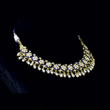 Traditional blue enamelled necklace adorned with sparkling diamond polki motifs and delicate pearl hangings, blending timeless artistry with graceful elegance for every special occasion.(KMNE3762)