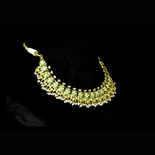 Green Enamelled Diamond Polki Necklace Set Traditional green enamelled necklace set adorned with sparkling diamond polki and delicate pearl hangings, paired with matching earrings for timeless elegance and festive charm.(KMNE3766)