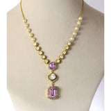 Fusion Diamond Polki Kunzite Necklace Set Elegant fusion necklace set featuring diamond polki, radiant round diamonds, vibrant kunzite gemstones, and pearl-accented chain, paired with matching earrings for contemporary sophistication.(KMNE3768)