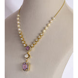 Fusion Diamond Polki Kunzite Necklace Set Elegant fusion necklace set featuring diamond polki, radiant round diamonds, vibrant kunzite gemstones, and pearl-accented chain, paired with matching earrings for contemporary sophistication.(KMNE3768)
