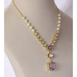 Fusion Diamond Polki Kunzite Necklace Set Elegant fusion necklace set featuring diamond polki, radiant round diamonds, vibrant kunzite gemstones, and pearl-accented chain, paired with matching earrings for contemporary sophistication.(KMNE3768)