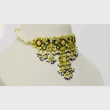 Traditional Peacock Diamond Polki Choker Set Traditional peacock design choker with matching earrings, crafted in diamond polki, vibrant enamel detailing, and pearl hangings, celebrating timeless Indian artistry and elegance.(KMNE3773)
