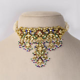 Traditional Peacock Diamond Polki Choker Set Traditional peacock design choker with matching earrings, crafted in diamond polki, vibrant enamel detailing, and pearl hangings, celebrating timeless Indian artistry and elegance.(KMNE3773)