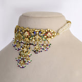 Traditional Peacock Diamond Polki Choker Set Traditional peacock design choker with matching earrings, crafted in diamond polki, vibrant enamel detailing, and pearl hangings, celebrating timeless Indian artistry and elegance.(KMNE3773)