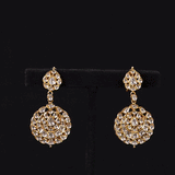 A masterpiece of traditional craftsmanship, this three-line Polki necklace with pendant and earrings radiates enduring elegance and royal charm.(KMNE3785)