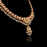 Grace every celebration with this handcrafted red meenakari necklace and earrings, featuring natural Polki diamonds and pearl accents.(KMNE3790)