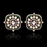 A striking fusion of heritage and modern glamour, this Polki diamond necklace set shines with brilliant diamonds and elegant green stones.(KMNE3791)