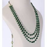 Three graceful strands of vibrant emerald beads, accented with lustrous pearls, create a timeless necklace that embodies refined luxury and effortless sophistication.(KMPE1197)
